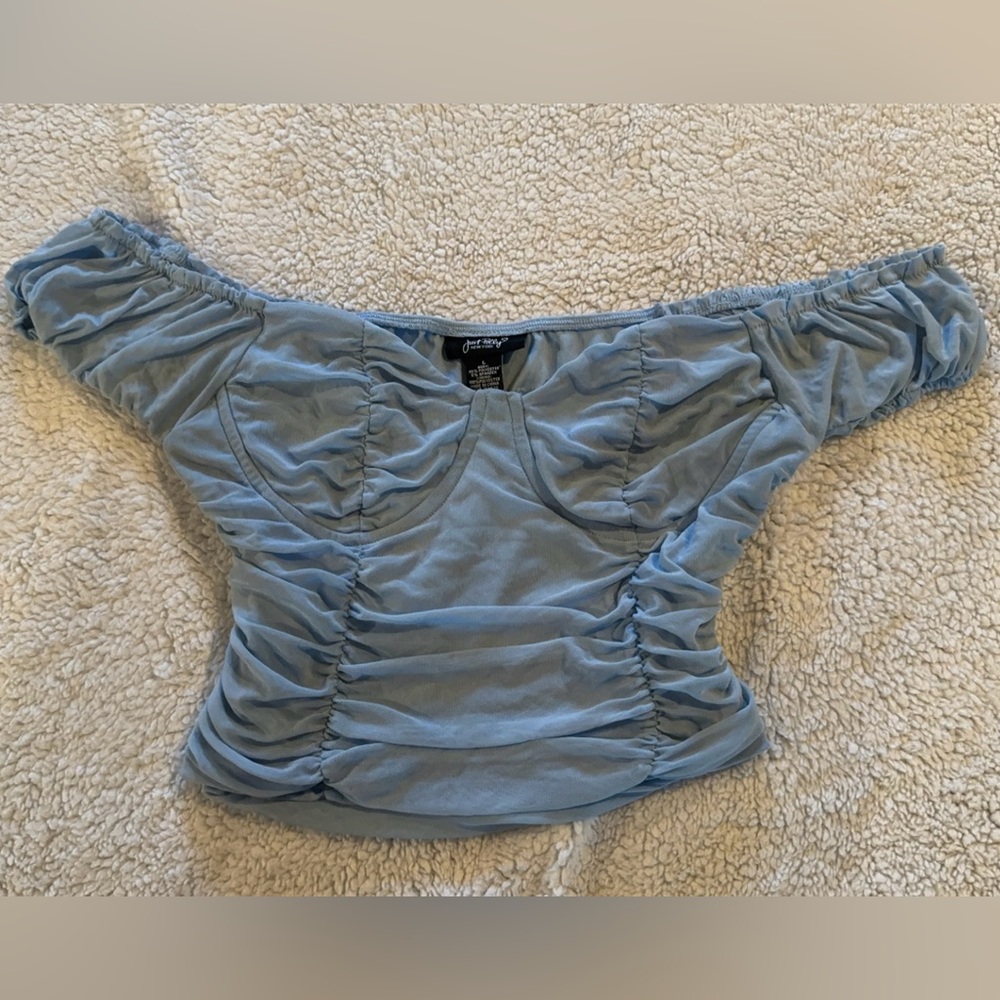 Woman’s off the shoulder top